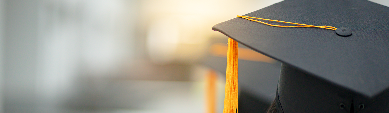 Student at graduation with Graduation Cap