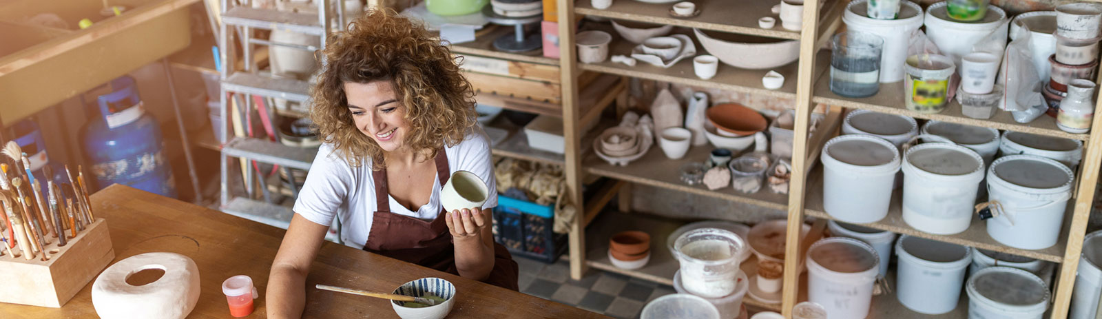 Female business owner running her shop