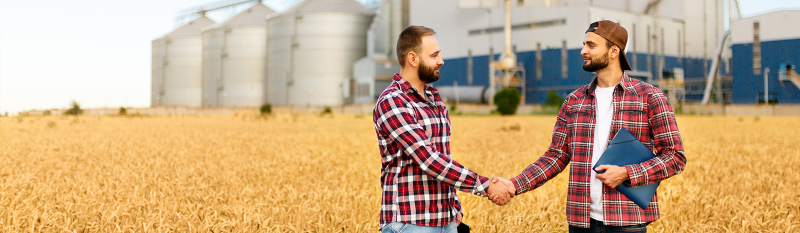 two farmers shaking hands